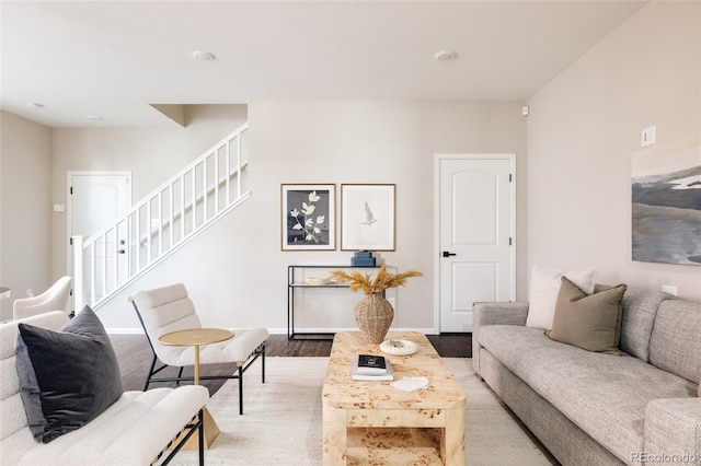 living room with light hardwood / wood-style flooring