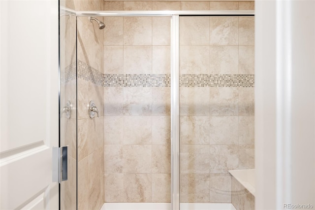 bathroom with an enclosed shower