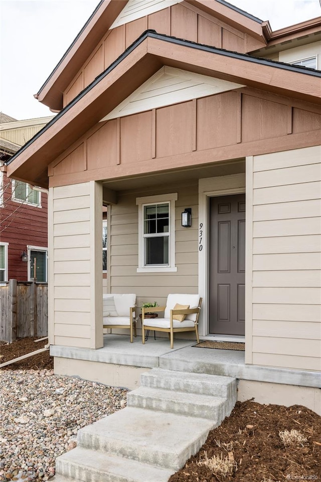 doorway to property featuring a porch