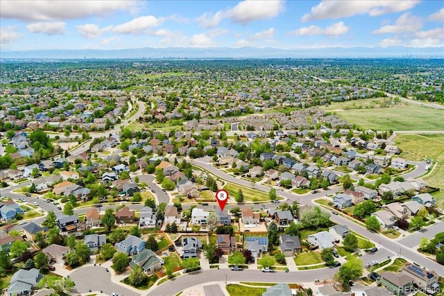 aerial view of property's location featuring nearby suburban area