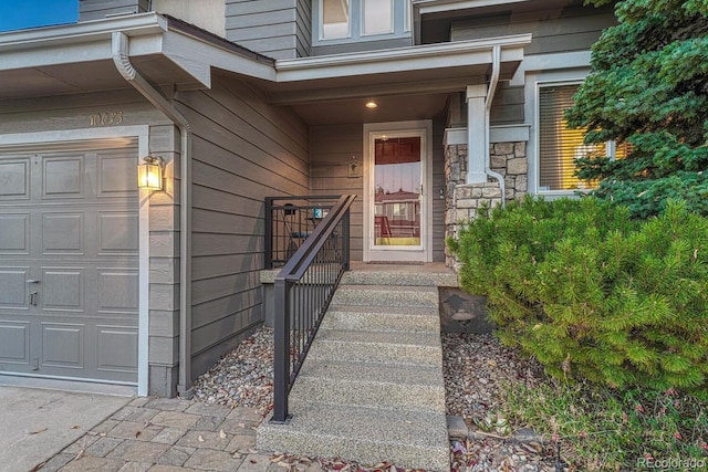 property entrance with a garage