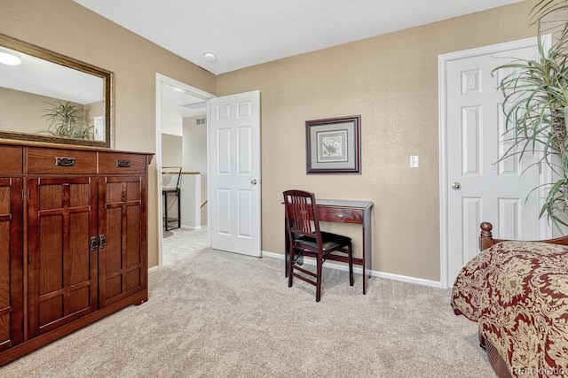 bedroom with light colored carpet