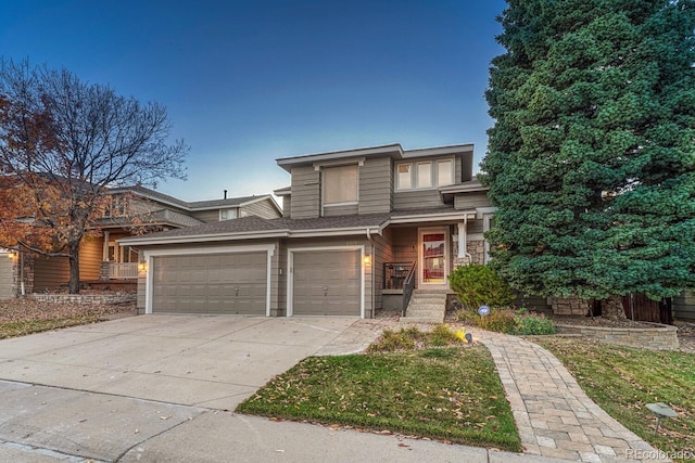 prairie-style home featuring a garage