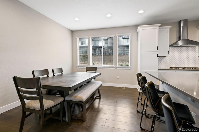 11350 W Grand Ave, Littleton, CO 80127 - dining space featuring dark wood-style flooring, baseboards, and recessed lighting