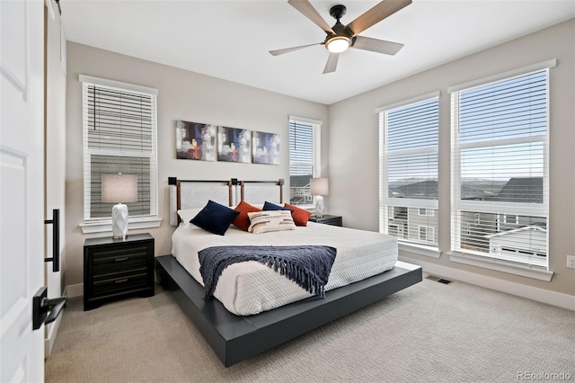 11350 W Grand Ave, Littleton, CO 80127 - bedroom with ceiling fan, baseboards, visible vents, and carpet floors