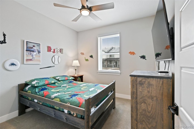 11350 W Grand Ave, Littleton, CO 80127 - bedroom with baseboards, a ceiling fan, and carpet
