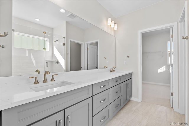 bathroom featuring vanity and walk in shower