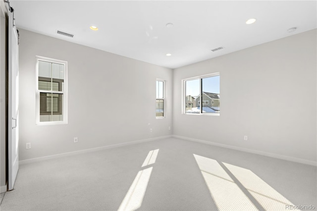 view of carpeted spare room