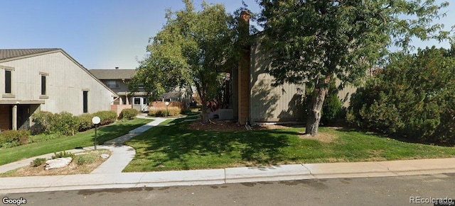 3548 S Hillcrest Dr Unit 2, Denver, CO 80237 - view of front facade featuring a front lawn