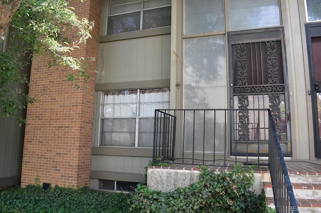 3548 S Hillcrest Dr Unit 2, Denver, CO 80237 - property entrance featuring brick siding