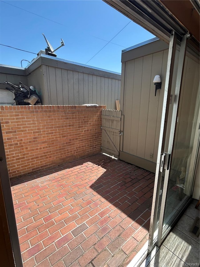3548 S Hillcrest Dr Unit 2, Denver, CO 80237 - view of patio with a gate