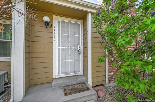 14110 E Dickinson Dr Unit A, Aurora, CO 80014 - entrance to property featuring central AC unit