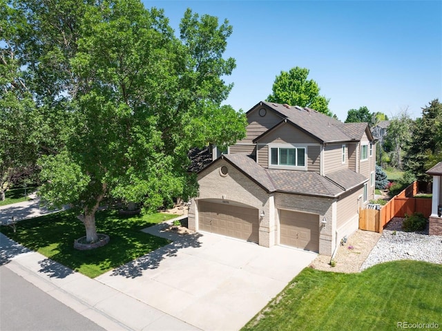 16690 Amberstone Way, Parker, CO 80134 - view of front of house with driveway, brick siding, an attached garage, and a shingled roof