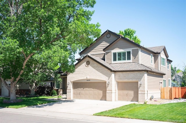 16690 Amberstone Way, Parker, CO 80134 - view of front of home with brick siding, driveway, and a garage