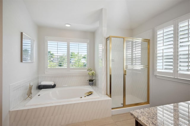 16690 Amberstone Way, Parker, CO 80134 - full bathroom featuring a garden tub and a stall shower