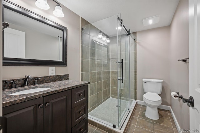 16690 Amberstone Way, Parker, CO 80134 - bathroom featuring vanity, a stall shower, and tile patterned floors