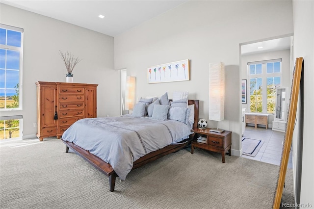 bedroom featuring light tile patterned floors