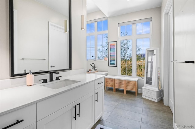 bathroom with vanity and tile patterned floors