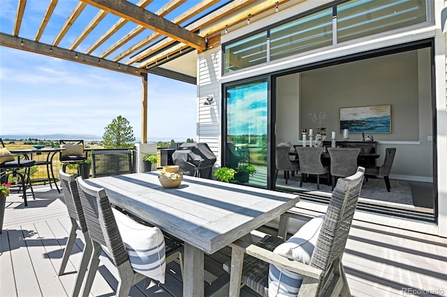 wooden terrace featuring grilling area and a pergola