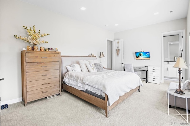 bedroom with light carpet