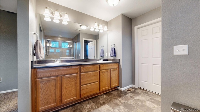19000 E 55th Ave, Denver, CO 80249 - bathroom with a stall shower, double vanity, and a textured wall