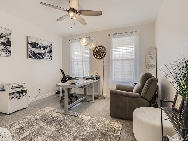 office space featuring carpet floors and ceiling fan