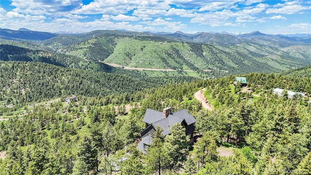 14980 Elk Mountain Trl, Littleton, CO 80127 - aerial view of a heavily wooded area and mountains