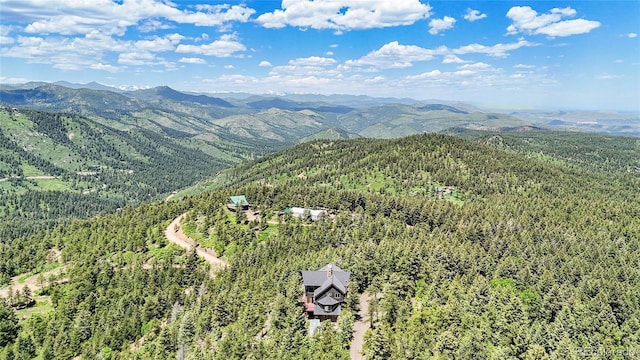 14980 Elk Mountain Trl, Littleton, CO 80127 - drone / aerial view of a mountainous background