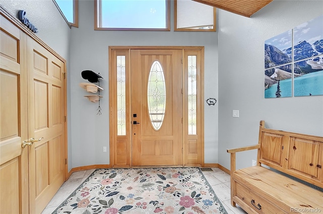 14980 Elk Mountain Trl, Littleton, CO 80127 - foyer featuring light tile patterned floors