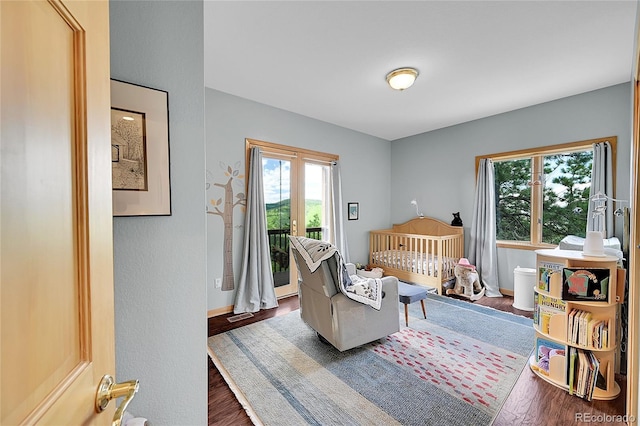 14980 Elk Mountain Trl, Littleton, CO 80127 - bedroom with wood finished floors and baseboards