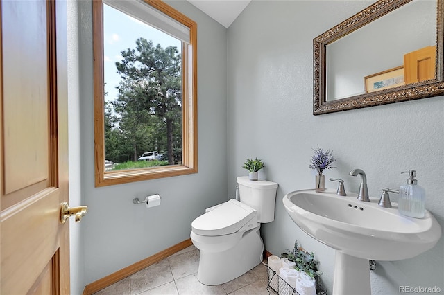 14980 Elk Mountain Trl, Littleton, CO 80127 - bathroom featuring toilet and tile patterned flooring
