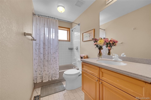 14980 Elk Mountain Trl, Littleton, CO 80127 - bathroom featuring shower / tub combo, vanity, and a textured wall