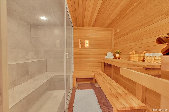 14980 Elk Mountain Trl, Littleton, CO 80127 - relaxing sauna / steam room featuring wood walls and wood ceiling
