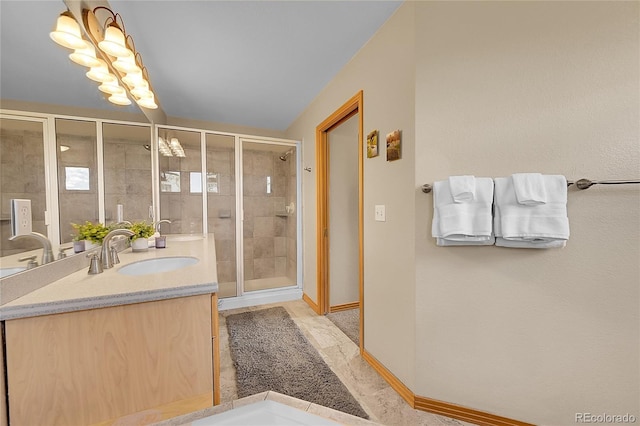 14980 Elk Mountain Trl, Littleton, CO 80127 - full bathroom with double vanity and a stall shower