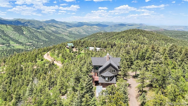14980 Elk Mountain Trl, Littleton, CO 80127 - view from above of property featuring a forest and mountains