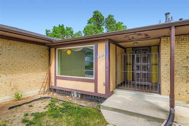 2122 S Yank Way, Lakewood, CO 80228 - view of exterior entry with brick siding