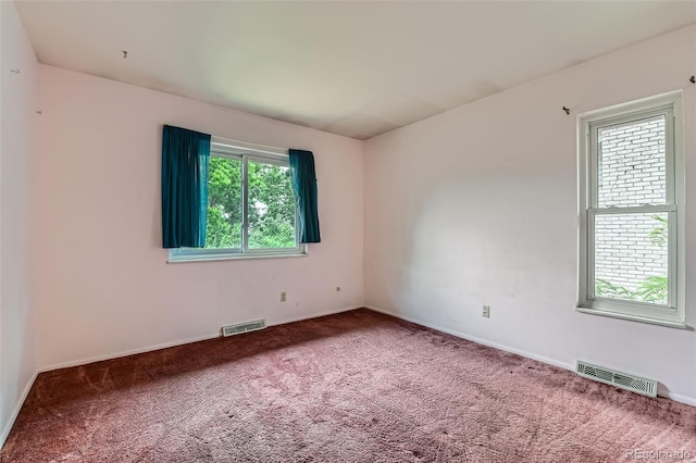 2122 S Yank Way, Lakewood, CO 80228 - spare room with carpet flooring and baseboards