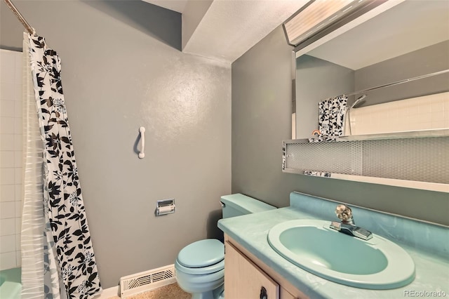 2122 S Yank Way, Lakewood, CO 80228 - bathroom featuring toilet and vanity