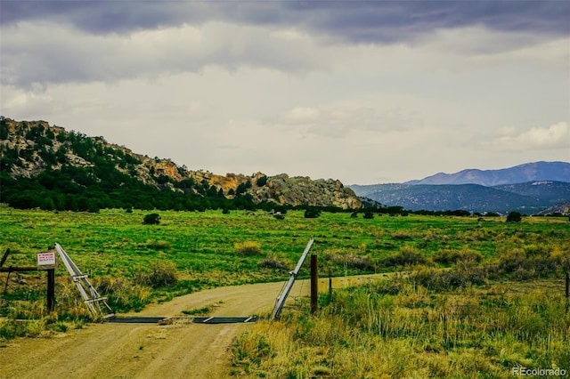 view of mountain feature featuring a rural view