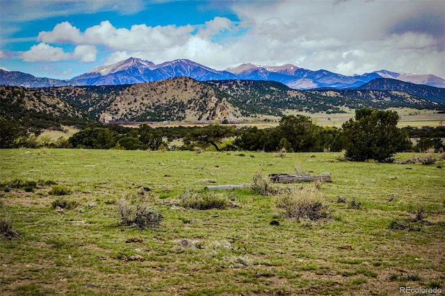 view of mountain feature with a rural view