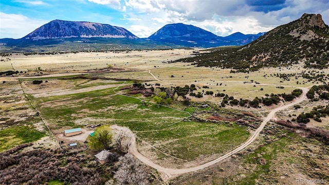 bird's eye view with a rural view and a mountain view