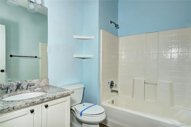 full bath featuring vanity,  shower combination, and toilet