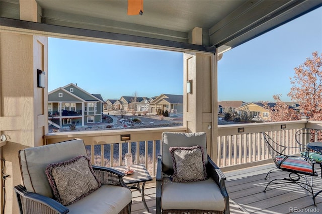 wooden deck with ceiling fan