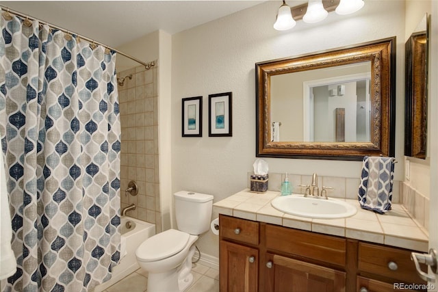 full bathroom with vanity, shower / bathtub combination with curtain, tile patterned floors, and toilet