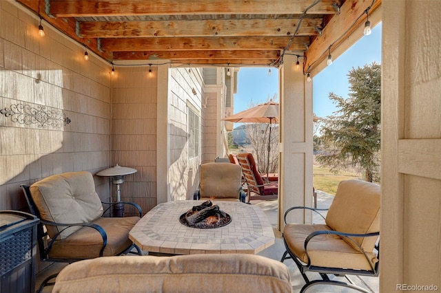 view of patio featuring a fire pit