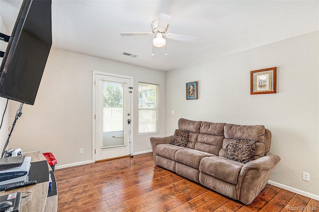 18786 E 57th Pl Unit A, Denver, CO 80249 - living area with a ceiling fan and hardwood / wood-style flooring