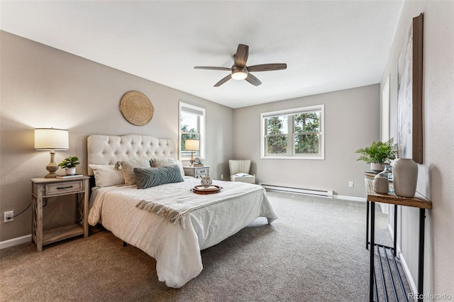 bedroom with a baseboard heating unit, carpet flooring, ceiling fan, and baseboards