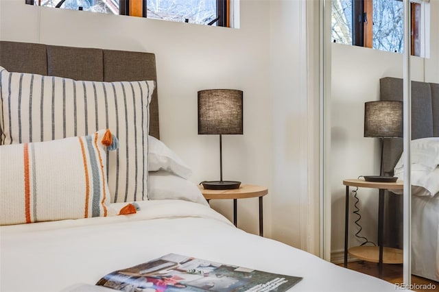 bedroom featuring wood finished floors