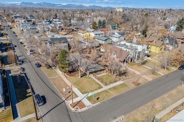 birds eye view of property featuring a mountain view and a residential view