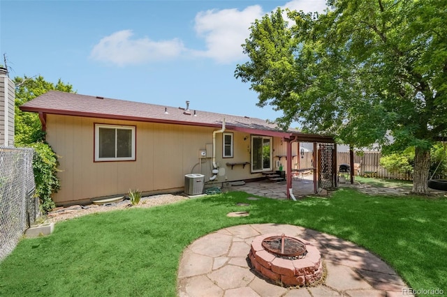 12941 S Princess Cir, Broomfield, CO 80020 - rear view of property featuring a fire pit, a patio, and a fenced backyard